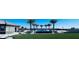 Luxury pool and patio with palm trees and grassy yard at 4160 W Ford Ave, Las Vegas, NV 89139