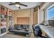 Bedroom with couch and built in cabinets with lots of desk space at 713 Antelope Way, Las Vegas, NV 89145