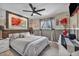 Comfortable bedroom featuring a ceiling fan, stylish decor, and bright, natural light at 713 Antelope Way, Las Vegas, NV 89145