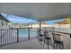 Inviting pool area with a covered patio, bar seating, and a fenced pool for safety and enjoyment at 713 Antelope Way, Las Vegas, NV 89145