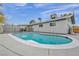 Well-maintained backyard pool with clean water surrounded by concrete patio next to the home at 713 Antelope Way, Las Vegas, NV 89145