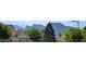Neighborhood street view with solar panels and mountain views in the background at 9728 Echo Hills Dr, Las Vegas, NV 89134