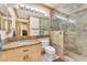 Elegant bathroom with marble shower and vanity at 10703 Rabbit Ridge Ct, Las Vegas, NV 89183