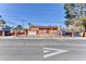 Two-story house with a large front yard and a long driveway at 1818 Waldman Ave, Las Vegas, NV 89102