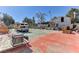 View of a backyard with a tennis court and recreational vehicle at 1818 Waldman Ave, Las Vegas, NV 89102