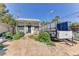 Front view of a charming house with a spacious yard and solar panels at 1818 Waldman Ave, Las Vegas, NV 89102