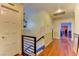 Bright hallway with wood floors, leading to other rooms at 1818 Waldman Ave, Las Vegas, NV 89102