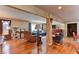 Bright living room features hardwood floors and open floor plan at 1818 Waldman Ave, Las Vegas, NV 89102