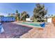 Refreshing pool with brick deck and arched metal structure at 1818 Waldman Ave, Las Vegas, NV 89102