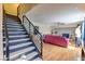 Modern staircase leads to living area with hardwood floors at 1818 Waldman Ave, Las Vegas, NV 89102