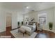 Bright bedroom with large windows, neutral decor, and comfortable furnishings at 6485 Arrow Cottage Ct, Las Vegas, NV 89130