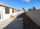 Backyard view with patio and block wall at 1113 Cloudy Day Dr, Henderson, NV 89074