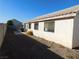 Backyard with block wall and gravel ground at 1113 Cloudy Day Dr, Henderson, NV 89074