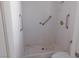 Accessible bathroom with walk-in shower and grab bars at 1113 Cloudy Day Dr, Henderson, NV 89074