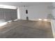 Spacious garage with overhead storage and open area at 1113 Cloudy Day Dr, Henderson, NV 89074