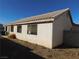 Rear house exterior with window and landscaping at 1113 Cloudy Day Dr, Henderson, NV 89074