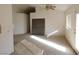 Sunlit living room with neutral colored carpeting at 1113 Cloudy Day Dr, Henderson, NV 89074