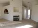 Living room with fireplace, high ceilings and access to exterior at 1113 Cloudy Day Dr, Henderson, NV 89074