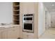 Close up of oven and shelving in this modern kitchen at 19 Rue Grimaldi Way, Henderson, NV 89011