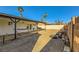 Backyard oasis with covered patio and fire pit at 3698 Rawhide Ct, Las Vegas, NV 89120