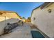 Backyard with fire pit, patio furniture, and BBQ at 3698 Rawhide Ct, Las Vegas, NV 89120