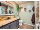 Bathroom with granite countertop, and a dinosaur head at 3698 Rawhide Ct, Las Vegas, NV 89120