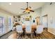 Dining room with farmhouse table and access to backyard at 3698 Rawhide Ct, Las Vegas, NV 89120