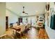 Bright dining room with a rustic wooden table and access to backyard at 3698 Rawhide Ct, Las Vegas, NV 89120