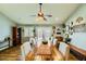 Dining room with farmhouse table and access to backyard at 3698 Rawhide Ct, Las Vegas, NV 89120