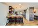 Modern kitchen with an island and dark brown cabinets at 3698 Rawhide Ct, Las Vegas, NV 89120