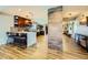 Modern kitchen with an island and dark brown cabinets at 3698 Rawhide Ct, Las Vegas, NV 89120