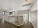 Spacious loft area with wood-look floors and views to the lower level at 504 Landra Ln, Henderson, NV 89015