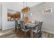 Elegant dining room featuring a modern table and chandelier at 1461 Bonner Springs Dr, Henderson, NV 89052