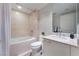 Well-lit bathroom featuring a tub, shower, vanity, and modern fixtures at 322 Karen Ave # 3707, Las Vegas, NV 89109