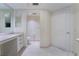 Clean bathroom featuring vanity with drawers, toilet, and well-lit mirror at 322 Karen Ave # 3707, Las Vegas, NV 89109
