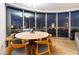 Dining area with large windows offering a stunning city view, table with seating at 322 Karen Ave # 3707, Las Vegas, NV 89109