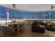 Dining area with a large window view, a round table, and modern chairs at 322 Karen Ave # 3707, Las Vegas, NV 89109