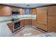 Stylish kitchen features stainless steel appliances, granite countertops, and custom wood cabinetry at 322 Karen Ave # 3707, Las Vegas, NV 89109