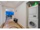 Modern laundry room with a stacked washer and dryer for convenient in-unit laundry at 322 Karen Ave # 3707, Las Vegas, NV 89109