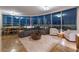 Open-concept living area with a sofa, city view, and dining area at 322 Karen Ave # 3707, Las Vegas, NV 89109