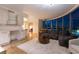 Spacious open-concept living area with city views and modern furnishings at 322 Karen Ave # 3707, Las Vegas, NV 89109