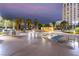 Tranquil pool area with comfortable lounge chairs and palm trees, perfect for relaxation and enjoyment at 322 Karen Ave # 3707, Las Vegas, NV 89109