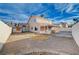 Large backyard with gravel and a view of the house at 1565 Pasture Ln, Las Vegas, NV 89110