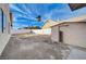 Backyard with shed and gravel landscaping at 1565 Pasture Ln, Las Vegas, NV 89110