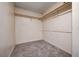 Spacious walk-in closet with built-in shelving and hanging rods at 1565 Pasture Ln, Las Vegas, NV 89110