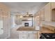 Kitchen view showcasing granite counters and gas stove at 1565 Pasture Ln, Las Vegas, NV 89110