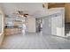 Living room, kitchen and stairs with tile floors at 1565 Pasture Ln, Las Vegas, NV 89110