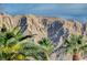 Stunning mountain views are a key feature of this property at 1565 Pasture Ln, Las Vegas, NV 89110