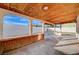 Covered patio with wood ceiling and access to backyard at 1565 Pasture Ln, Las Vegas, NV 89110