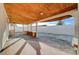 Covered patio with concrete flooring and wood ceiling at 1565 Pasture Ln, Las Vegas, NV 89110